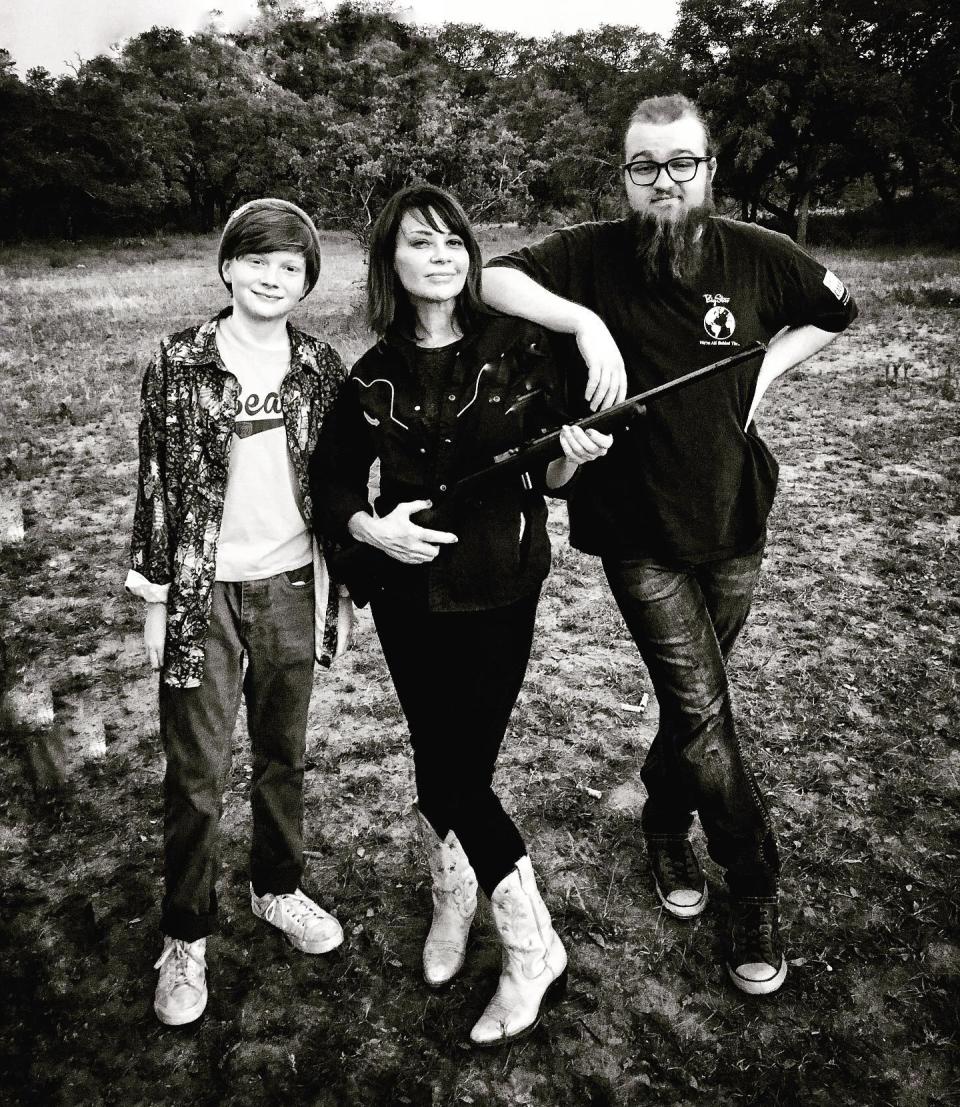 Angus T Jones with his mum and brother