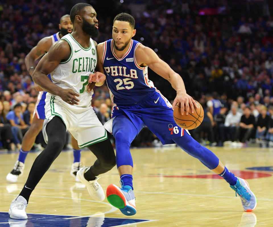 PHILADELPHIA, PA - OCTOBER 23: Ben Simmons #25 of the Philadelphia 76ers drives on Jaylen Brown #7 of the Boston Celtics at Wells Fargo Center on October 23, 2019 in Philadelphia, Pennsylvania. The 76ers won 107-93. NOTE TO USER: User expressly acknowledges and agrees that, by downloading and or using this photograph, User is consenting to the terms and conditions of the Getty Images License Agreement.  (Photo by Drew Hallowell/Getty Images)