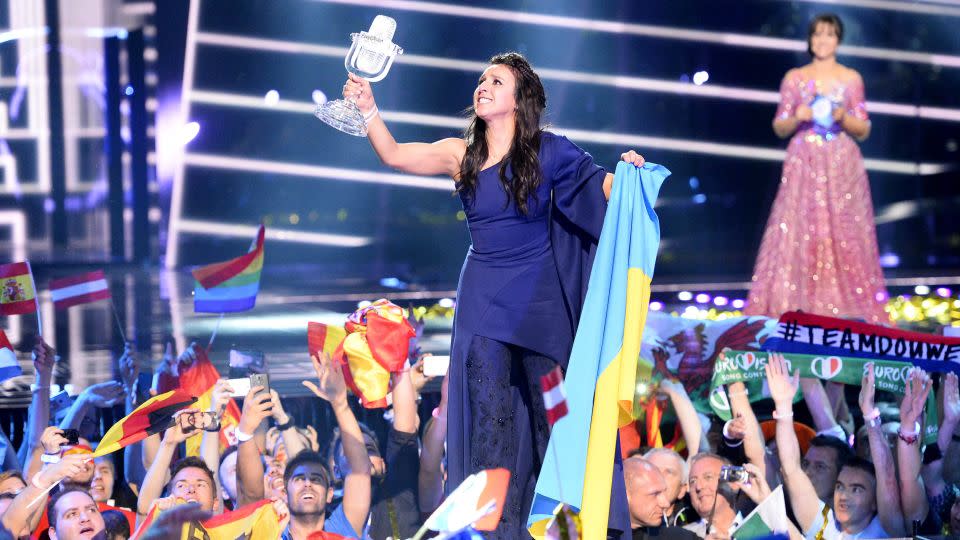 The Ukrainian singer holds the Eurovision trophy. - Jonathan Nackstrand/AFP/Getty Images/File