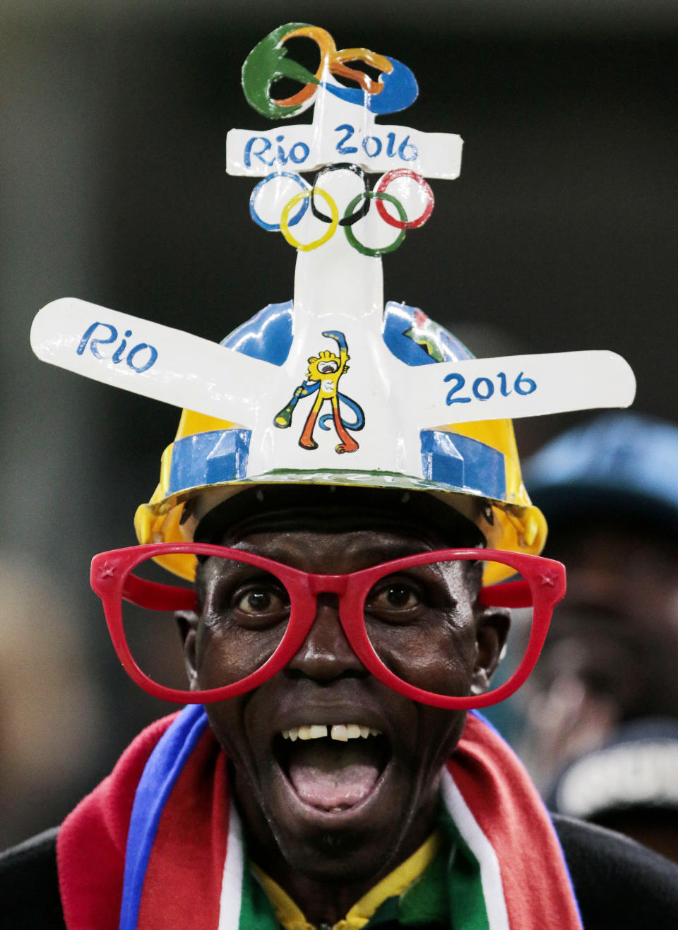 Fans of South Africa cheer their team during their Rio 2016 Olympic Games First Round Group A men's football match South Africa vs Iraq at the Corinthians Arena, in Sao Paulo, Brazil, on August 10, 2016.