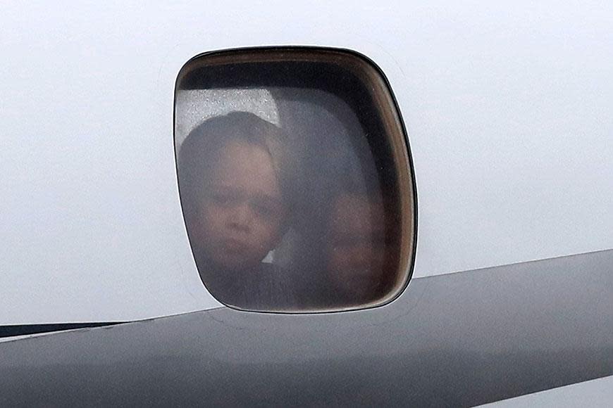 The kids could be seen through the plane's windows.