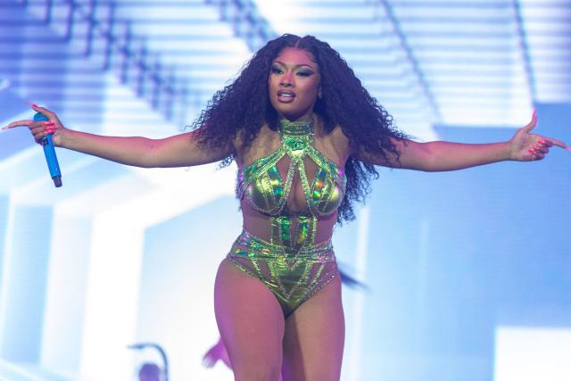 Lizzo Wears Neon and Nude Illusion Catsuit in New York City