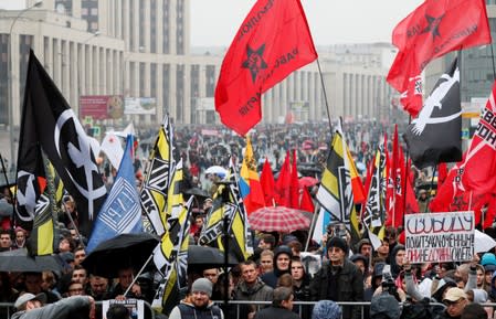 People attend a rally to demand the release of opposition protesters in Moscow