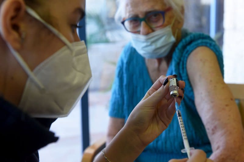 Although protection against COVID-19 wanes over time, about 97% of adults have some immunity from past COVID infections, vaccinations or both. The updated shots announced Monday are expected to boost that coverage.File Photo by Debbie Hill/UPI