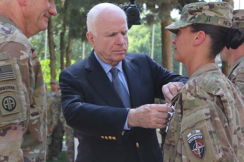 <p>McCain with NATO soldiers in Kabul, Afghanistan on July 4, 2017. </p>