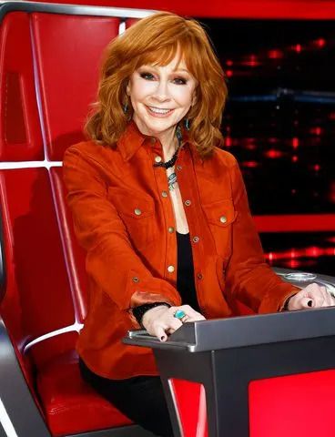 <p>Trae Patton/NBC via Getty</p> Reba McEntire on The Voice