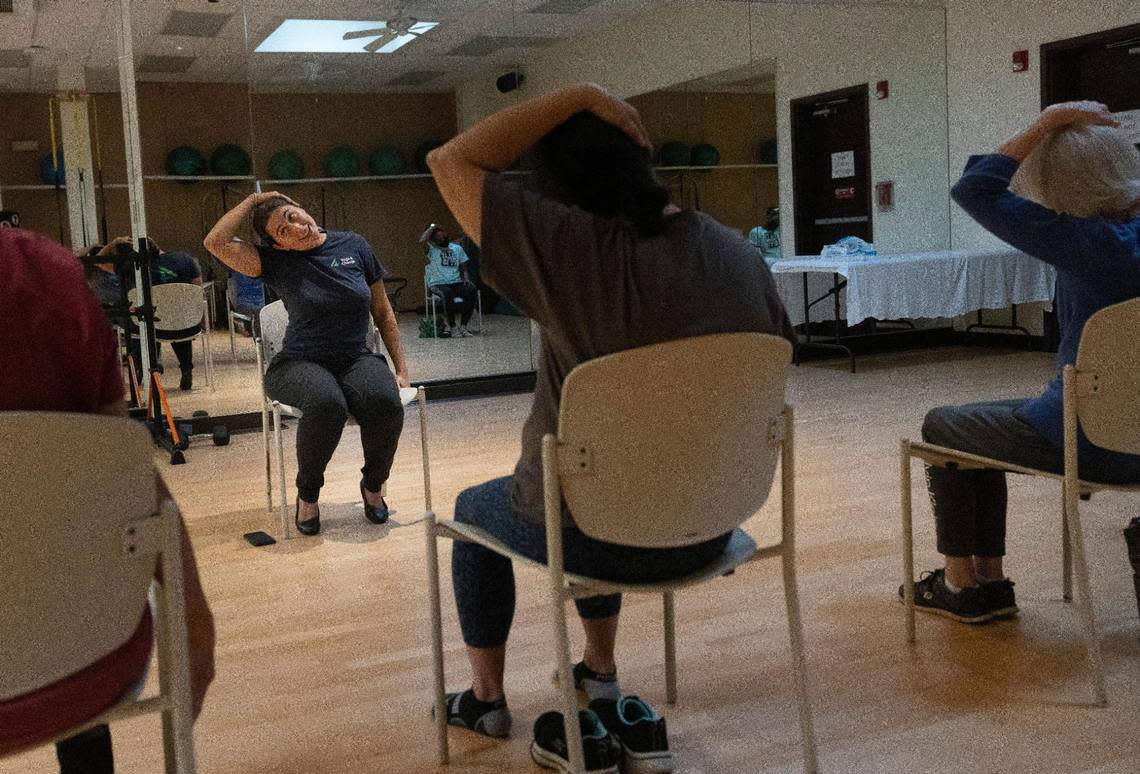 Stefany Babain teaches during a yoga class for breast cancer patients on Wednesday, Oct. 4, 2023, at Memorial Rehabilitation Institute Outpatient Treatment Center in Hollywood.