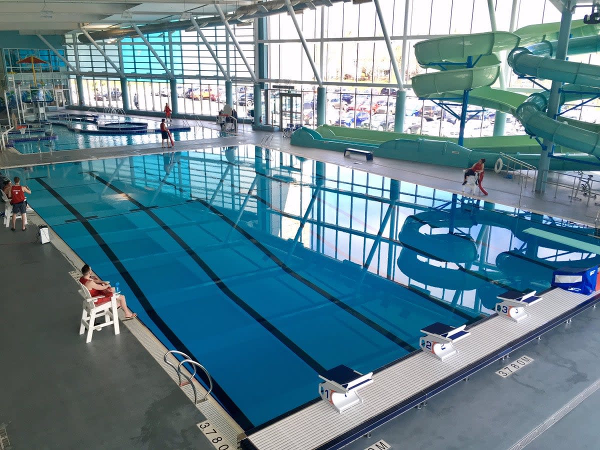 The big attractions at the Paul Reynolds Community Centre are its two swimming pools and dual water slides.  (Jeremy Eaton/CBC - image credit)