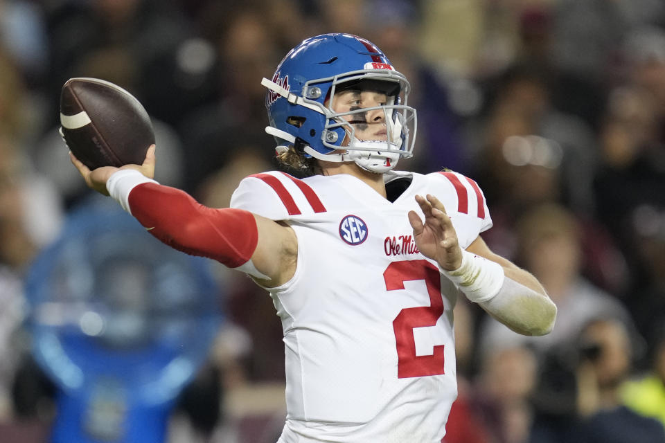 Mississippi quarterback Jaxson Dart (2) passes down field against Texas A&M during the first half of an NCAA college football game Saturday, Oct. 29, 2022, in College Station, Texas. (AP Photo/Sam Craft)