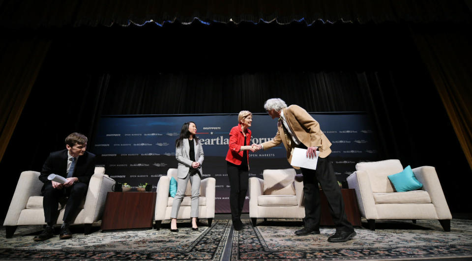 Sen. Elizabeth Warren (Mass.) arrives onstage at the HuffPost Heartland Forum in Storm Lake, Iowa.