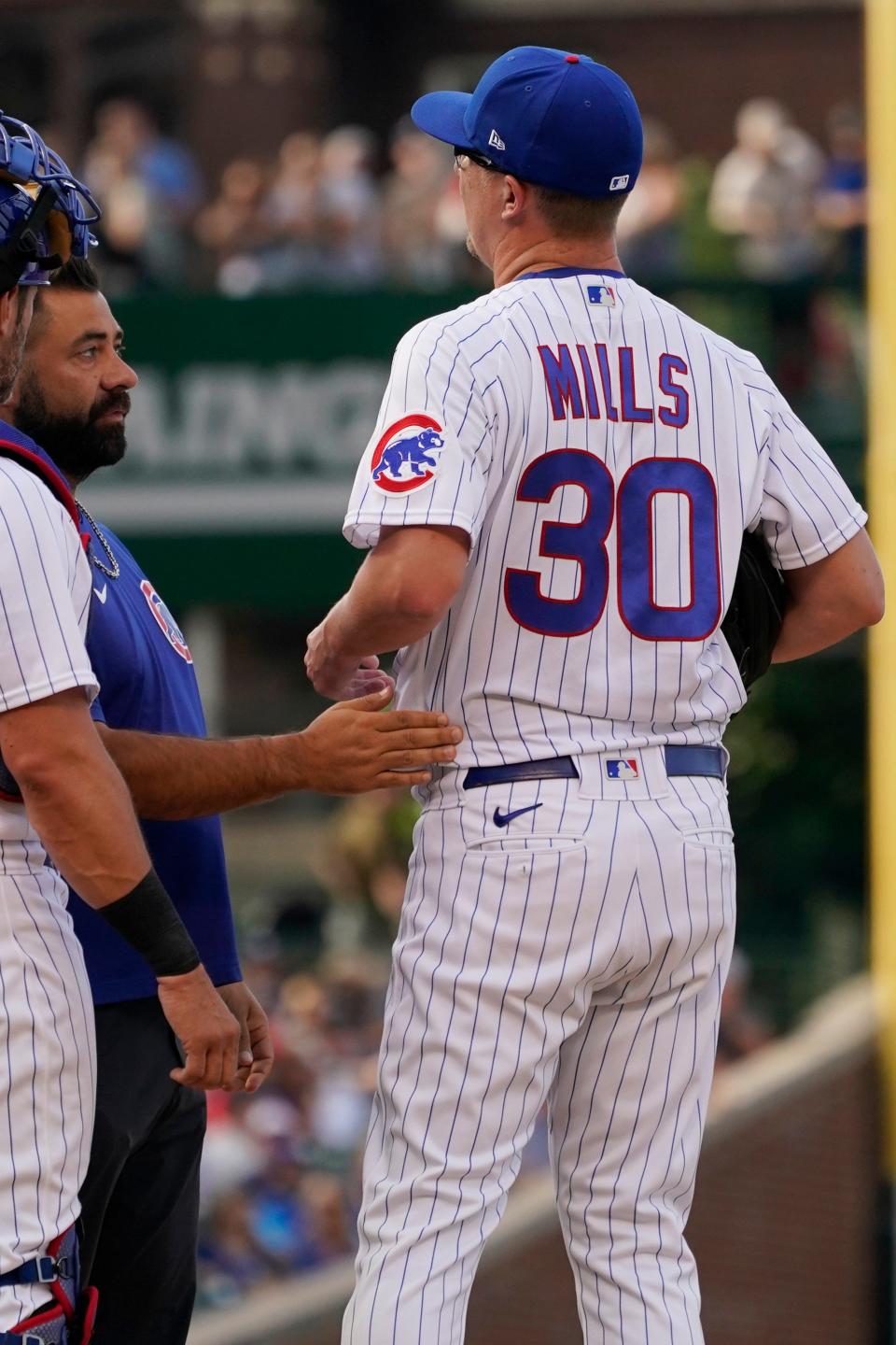 Alec Mills, shown in 2022 pitching for the Cubs, Mills, has pitched 11 minor-league innings across four appearances (three starts), said he felt like his normal self by the time he made his most recent, four-inning start for Triple-A Louisville.