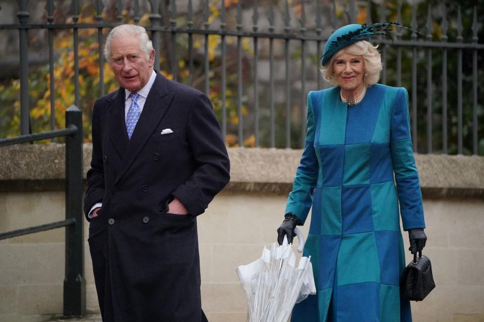 Britain's Prince Charles and Camilla, Duchess of Cornwall arrive to attend the Christmas Day morning church service at St George's Chapel, Windsor Castle in Windsor, Britain December 25, 2021. Jonathan Brady/Pool via REUTERS