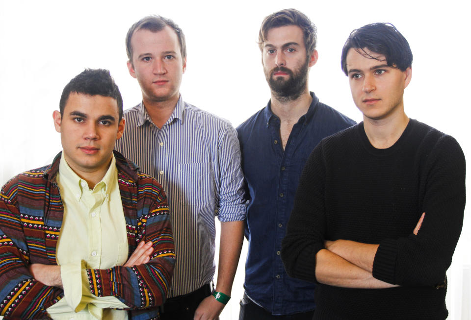 This March 14, 2013 photo shows members of the band Vampire Weekend, from left, Rostam Batmanglij, Chris Baio, Chris Thomson and Ezra Koenig posing during the SXSW Music Festival in Austin, Texas. The band's latest album, "Modern Vampires of the City," was released on Tuesday. (Photo by Jack Plunkett/Invision/AP)