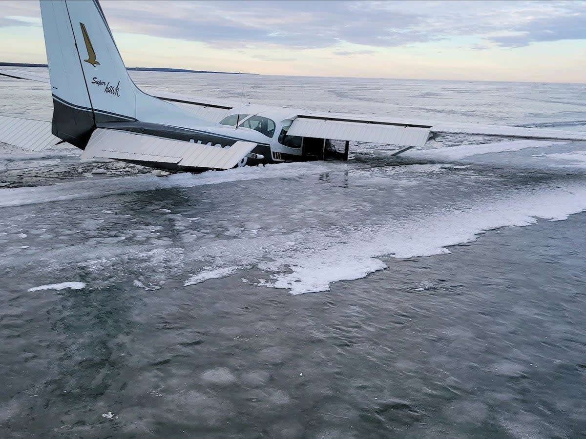 A Cessna plane sinks through the ice on Upper Red Lake in Washkish, Minnesota, 19 December 2023 (Beltrami County Sheriff's Office via AP)
