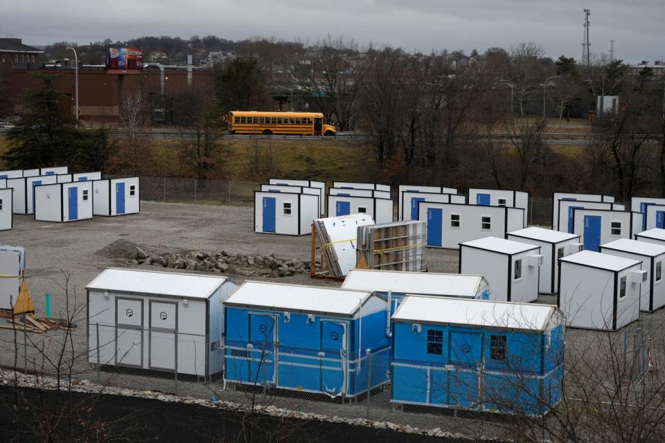 In March, ECHO Village pallet shelters await placement on state land off Victor Street in Providence, behind the Foxy Lady.