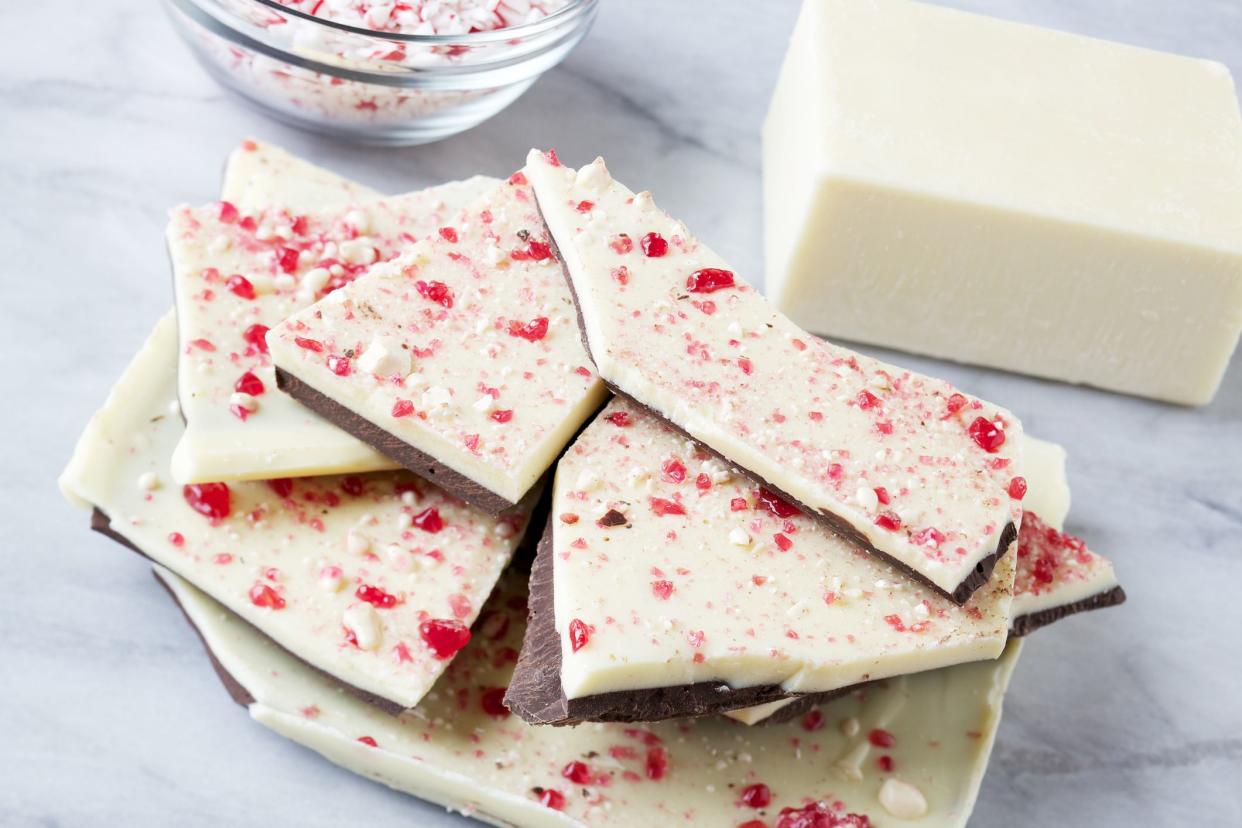 Studio photo of stack of peppermint bark classic Christmas candy with ingredientsPlease view more modern food images here:
