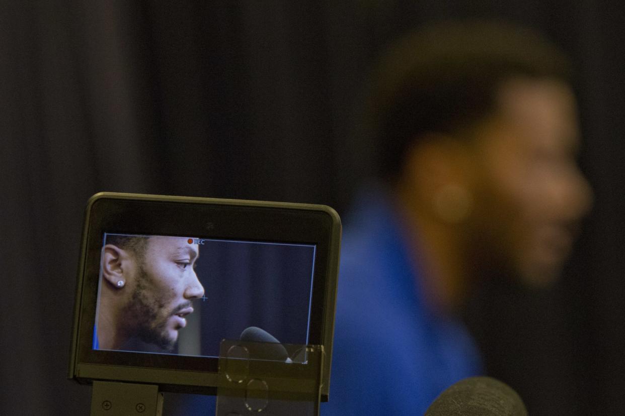 Derrick Rose is displayed on the screen of a video camera as he speaks during a news conference at Madison Square Garden, Friday, June 24, 2016, in New York. (AP/Mary Altaffer)