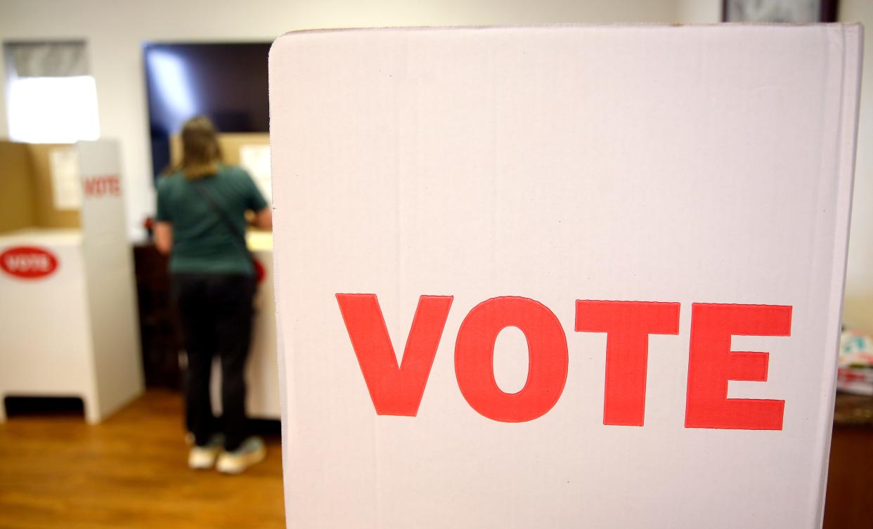 A person votes in an Edmond election at Stonegate Cumberland Presbyterian Church in Edmond, Oka., Tuesday, April, 5, 2022. 