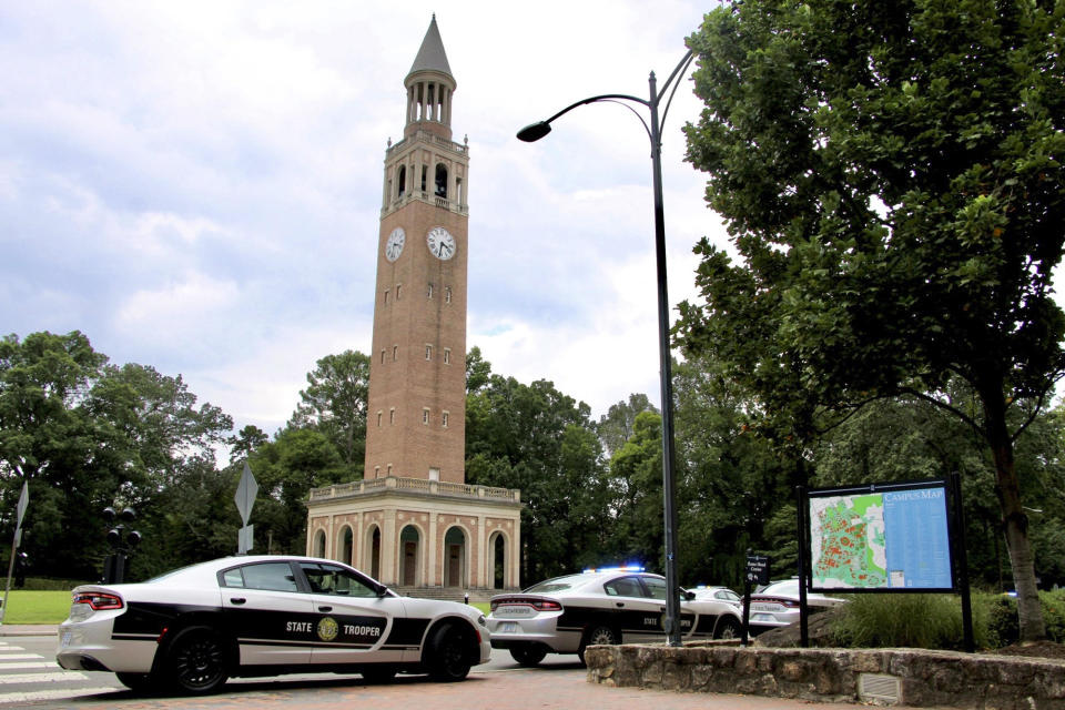 Law enforcement respond to the University of North Carolina at Chapel Hill campus in Chapel Hill, N.C., on Monday, Aug. 28, 2023, after the university locked down and warned of an armed person on campus. / Credit: Hannah Schoenbaum / AP