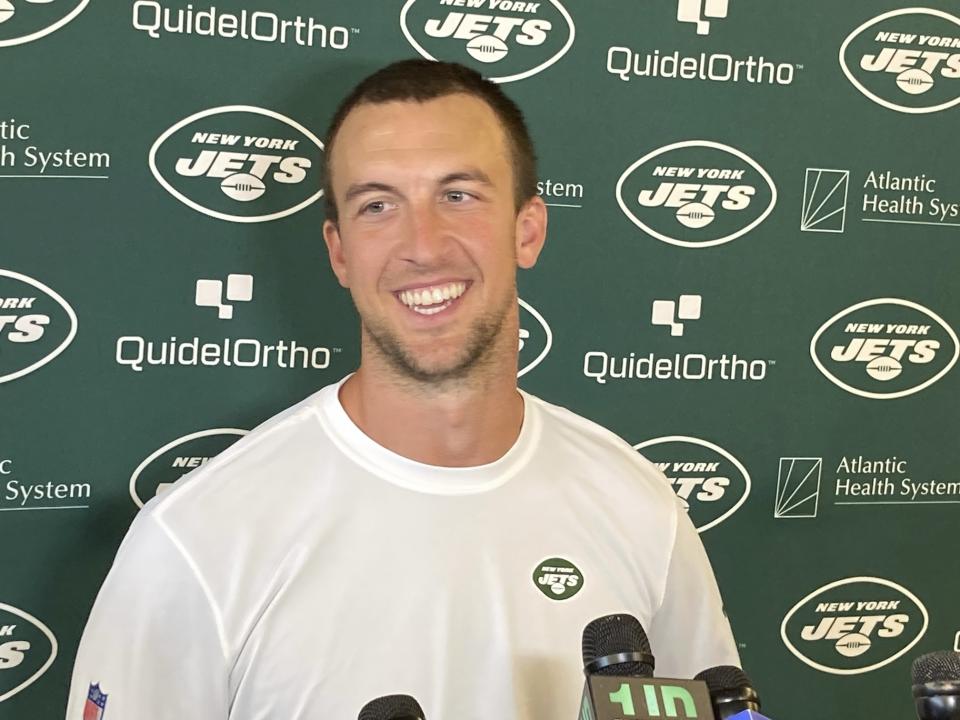 New York Jets quarterback Trevor Siemian smiles while speaking with reporters at the team's facility in Florham Park, N.J., on Wednesday, Sept. 27, 2023. Siemian was signed to the Jets' practice squad as a backup to starter Zach Wilson. (AP Photo/Dennis Waszak Jr.)