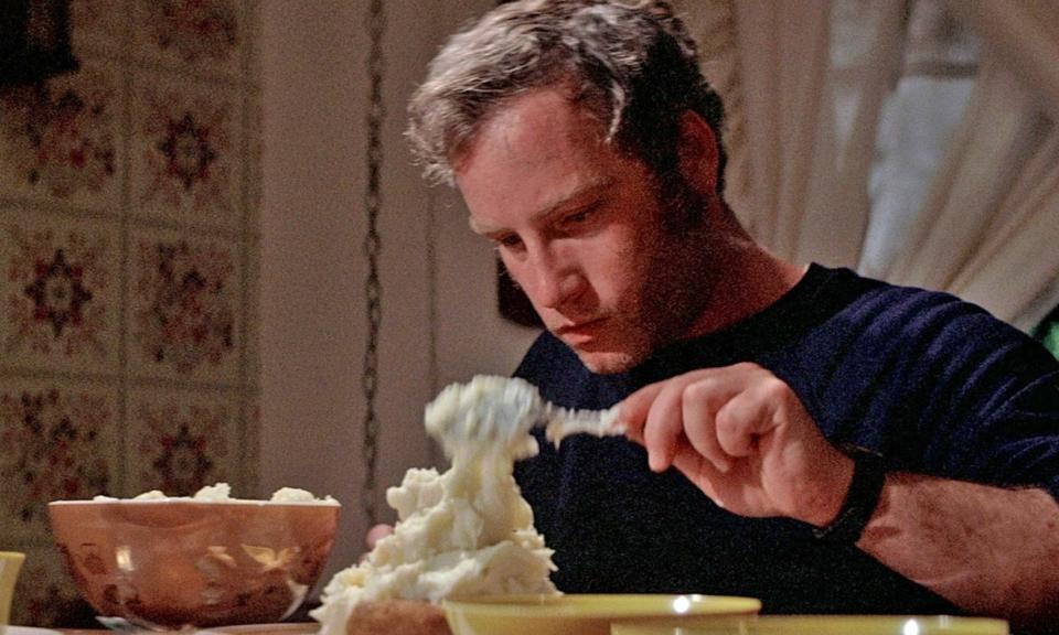 Roy Neary (Richard DreyFuss) sculpts mashed potatoes, in a daze, in "Close Encounters of the Third Kind" (1977). <cite>Columbia Pictures</cite>