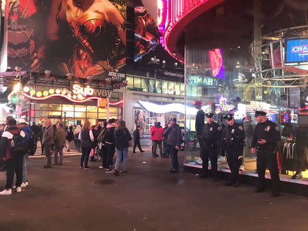 New York Police Department officers stand in midtown Manhattan, following a pickup truck attack on a Manhattan bike path, in New York, U.S. October 31, 2017. REUTERS/Devika Krishna Kumar