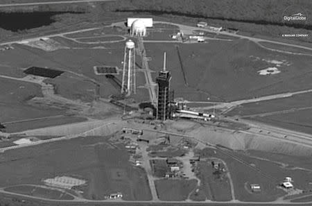 A SpaceX Falcon 9 rocket with the company's Crew Dragon spacecraft onboard at Launch Complex 39A is seen in this DigitalGlobe Satellite image at Cape Canaveral, Florida, U.S. on February 28, 2019. ©2019 DigitalGlobe, a Maxar company/Handout via REUTERS