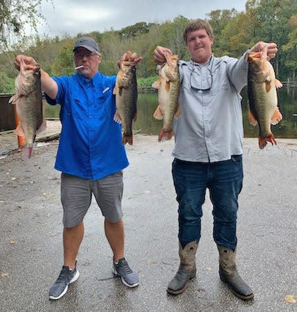 Brant Sims, left, and Cody Sims had 32.32 pounds to win first place in the Rebel Boy's Bass Club classic tournament is Nov. 20 at Lake Istokpoga.