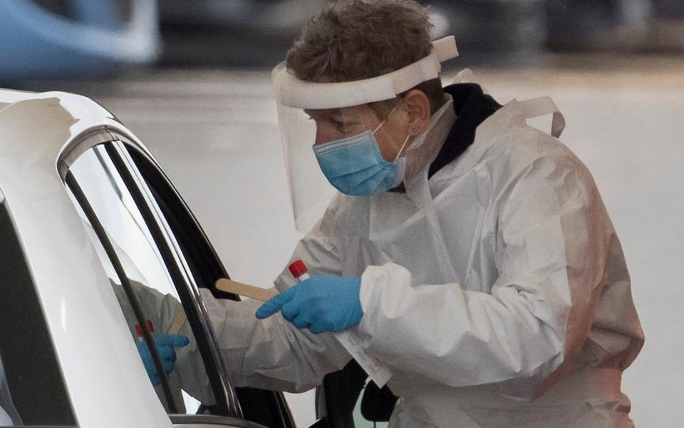 Medical staff carry out Covid-19 tests at a drive through test site next to Watford General hospital in Hertfordshire, - Ben Cawthra/London News Pictures Ltd 