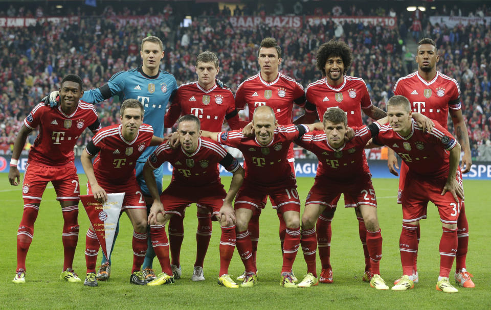 The team of FC Bayern pose for a team group prior to the Champions League semifinal second leg soccer match between Bayern Munich and Real Madrid at the Allianz Arena in Munich, southern Germany, Tuesday, April 29, 2014. (AP Photo/Matthias Schrader)