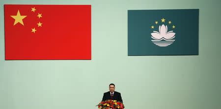 Fernando Chui speaks after being sworn in as Macau's Chief Executive in Macau, on the day marking the 10th anniversary of the former Portuguese enclave's handover to Chinese rule, in this December 20, 2009 file photo. REUTERS/Bobby Yip/Files