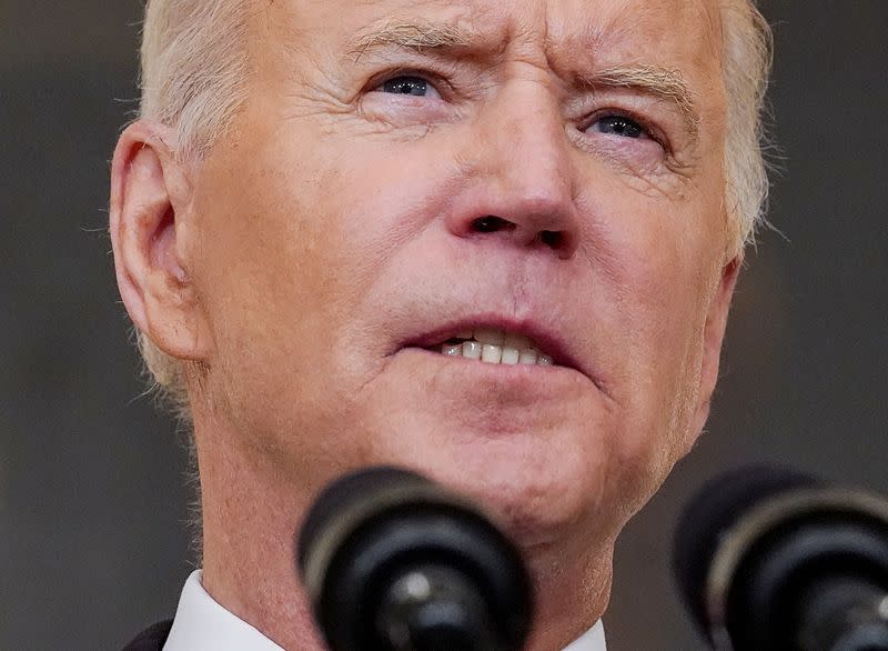 FILE PHOTO: U.S. President Joe Biden delivers remarks on the Delta variant and his administration's efforts to increase vaccinations, from the State Dining Room of the White House in Washington