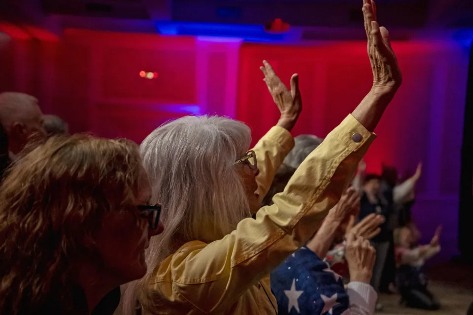 Attendees participate in FlashPoint LIVE at The Founders Inn and Spa in Virginia Beach on Friday, April 26, 2024.  (Carlos Bernate for NBC News)