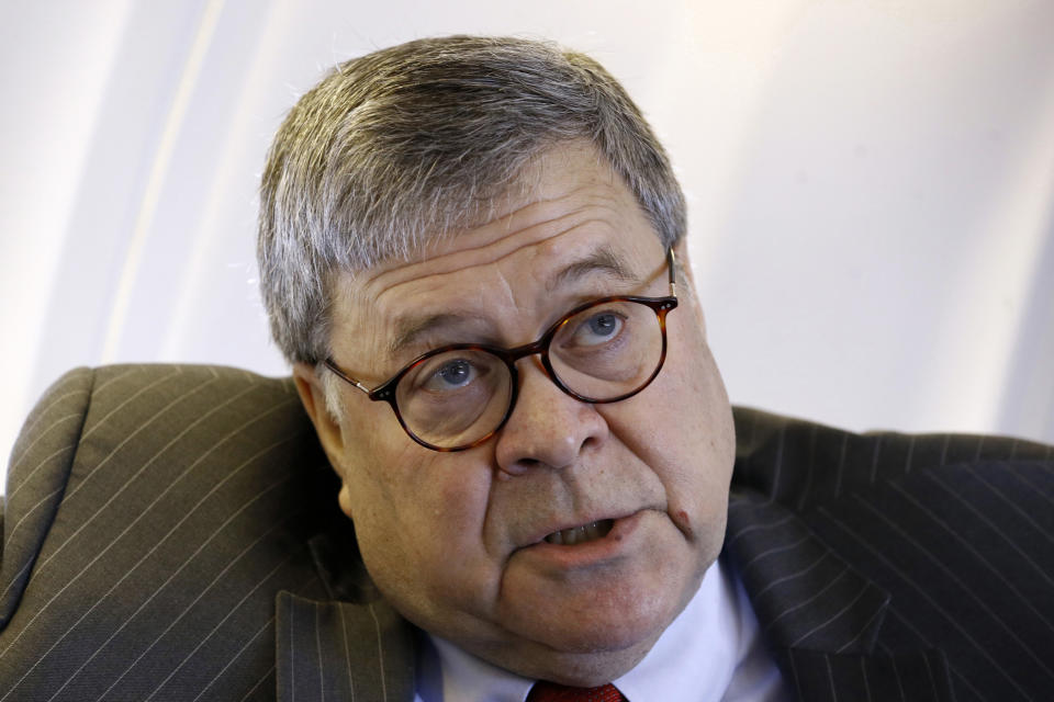 Attorney General William Barr speaks with an Associated Press reporter onboard an aircraft en route to Cleveland, Thursday, Nov. 21, 2019, during a two-day trip to Ohio and Montana. (AP Photo/Patrick Semansky)