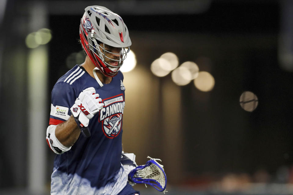 FILE - Cannons' Paul Rabil (99) reacts after a goal during a Premier Lacrosse League game against the Redwoods, on June 4, 2021, in Foxborough, Mass. World Lacrosse, the international governing body of the sport, is making a proposal to have the Native American sport included in the 2028 Los Angeles Olympics. (AP Photo/Steve Luciano, File)
