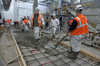 Hard at work at the ventilation facility on 11th Avenue between 35th and 37th streets. <a href="http://www.flickr.com/photos/mtaphotos/sets/72157632219715741" rel="nofollow noopener" target="_blank" data-ylk="slk:(Photo by Patrick Cashin/Metropolitan Transportation Authority);elm:context_link;itc:0;sec:content-canvas" class="link ">(Photo by Patrick Cashin/Metropolitan Transportation Authority)</a>