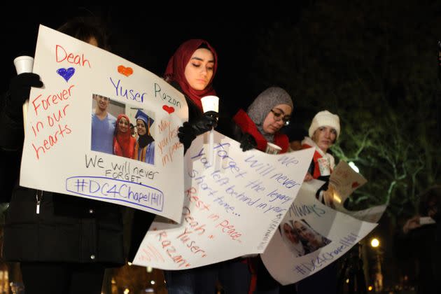 People hold a vigil at Dupont Circle in Washington on Feb. 12, 2015, for Deah Barakat, 23, his wife Yusor Mohammad Abu-Salha, 21, and her sister Razan Mohammad Abu-Salha, 19, who were shot dead in Chapel Hill, North Carolina.  (Photo: Anadolu Agency via Getty Images)