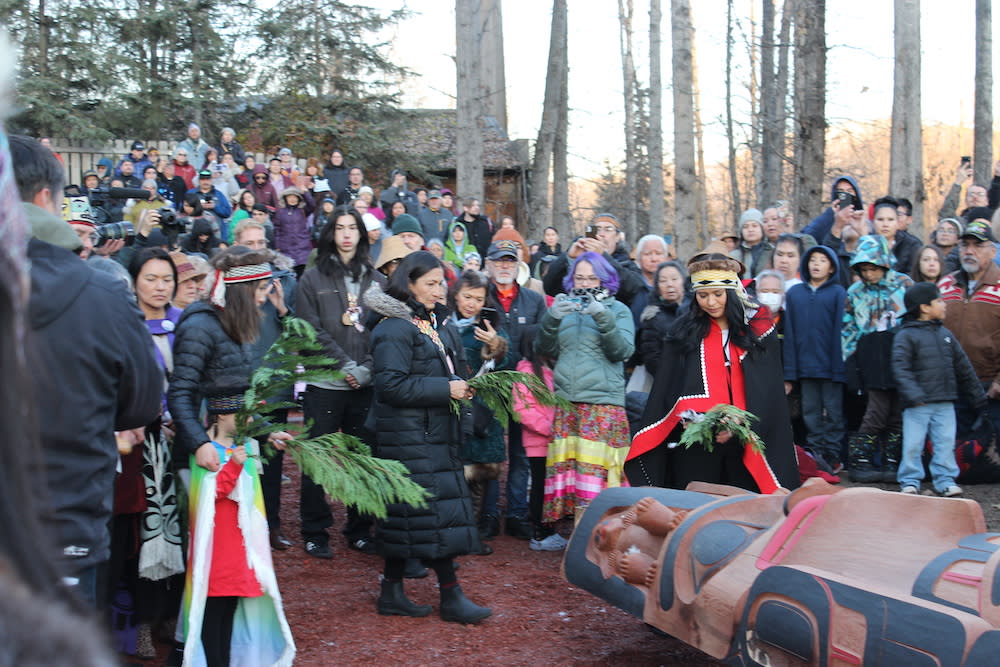  Interior Secretary Deb Haaland assisted in the blessing of the healing totem pole at the Alaska Native Heritage Center in Anchorage, Alaska. (Photo: Levi Rickert for Native News Online)