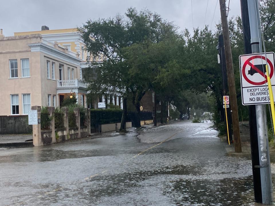 Early floods in Charleston on Friday morning (Richard Hall/The Independent)