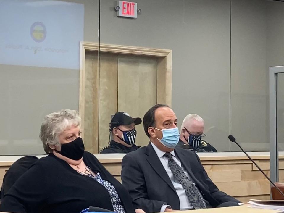 Beverly Green (left) and defense attorney Sam Ferruccio Jr. (right) appear in Canton Municipal Court. A criminal mischief charge against Green was dismissed on Wednesday. She was accused of removing a village sign and tossing it in the mulch outside of Village Hall on Dec. 16.