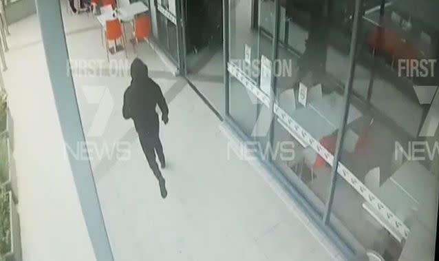 CCTV shows masked gunman run up and shoot 'Mr Big' of Sydney's underworld crime in broad daylight. Photo: 7 News