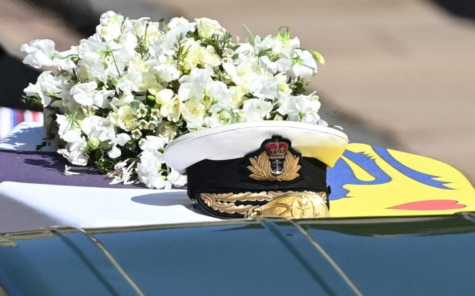 A wreath of flowers lies on the coffin during Prince Philip's ceremonial funeral procession - Leon Neal/Pool/AFP via Getty