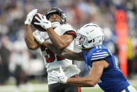 Tampa Bay Buccaneers' Antoine Winfield Jr. (31) makes an interception against Indianapolis Colts' Michael Pittman (11) during the second half of an NFL football game, Sunday, Nov. 28, 2021, in Indianapolis. (AP Photo/AJ Mast)