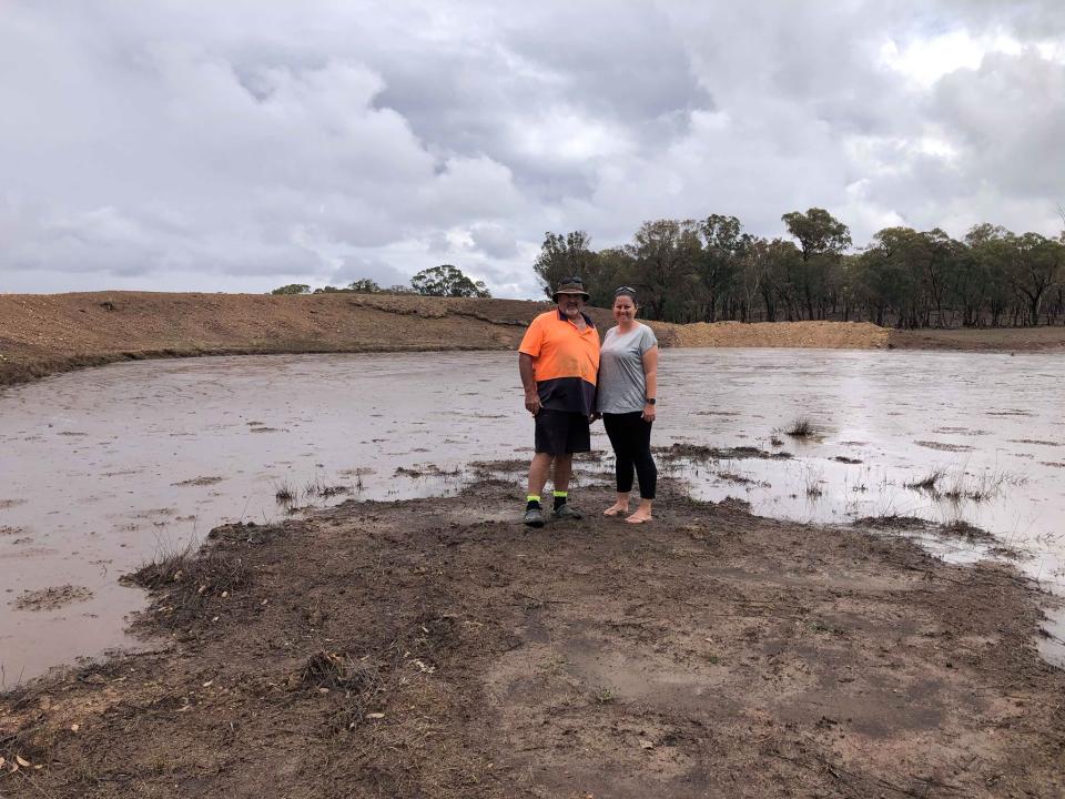 Ms Groth and said her grazier dad Chris Strahle (pictured together) was forced to sell most of their 70 cows because of the drought. Source: Lindsay Groth 