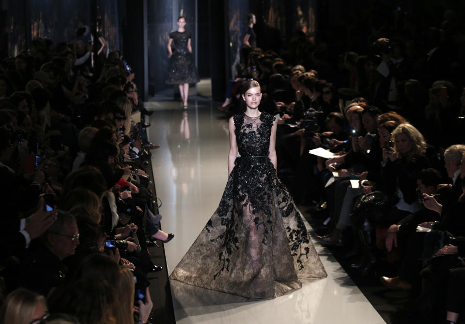 A model wears a creation by Lebanese fashion designer Elie Saab for his Spring Summer 2013 Haute Couture fashion collection, presented in Paris, Wednesday, Jan.23, 2013. (AP Photo/Christophe Ena)