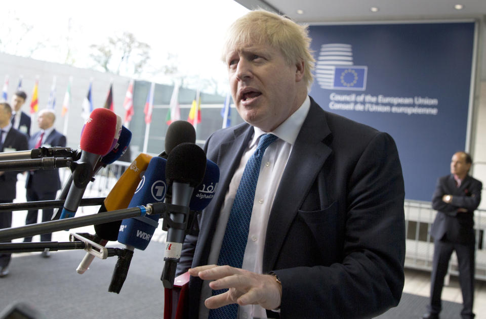 British Foreign Secretary Boris Johnson speaks with the media as he arrives for a meeting of EU foreign ministers at the EU Council building in Luxembourg on Monday, April 16, 2018. (AP Photo/Virginia Mayo)