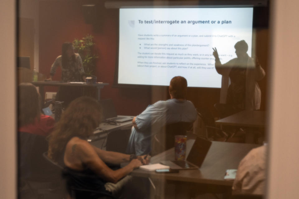 Dr. Stephanie Laggini Fiore, Associate Vice Provost and Sr. Director of the Center for the Advancement of Teaching, right, hosts a faculty teaching circle on artificial intelligence alongside Lori Anne Salem, Assistant Vice Provost and Director of the Student Success Center, on Wednesday, Aug. 9, 2023, at Temple University in Philadelphia. Educators say they want to embrace the technology’s potential to teach and learn in new ways, but when it comes to assessing students, they see a need to “ChatGPT-proof” test questions and assignments. (AP Photo/Joe Lamberti)