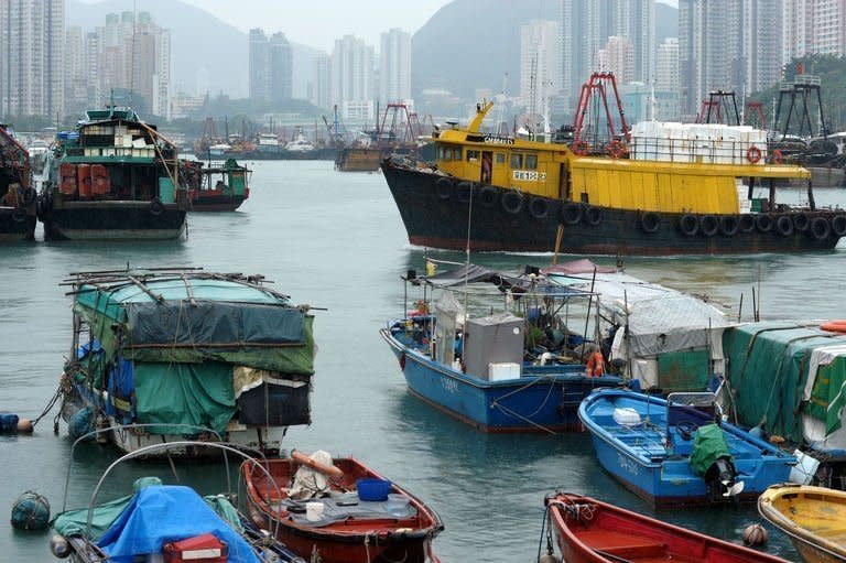 A Hong Kong ship is brought into Aberdeen harbour ahead of the arrival of Typhoon Usagi, on September 22, 2013