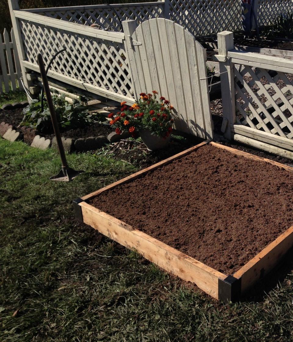 A raised bed garden sits on top of your existing soil. It consists of a frame, usually wood, filled with rich soil.