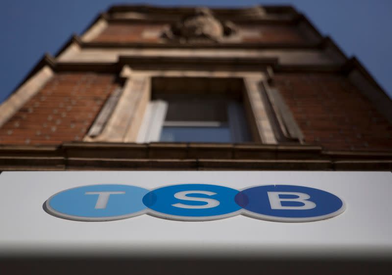 FILE PHOTO: A sign is displayed outside a branch of the TSB bank in central London